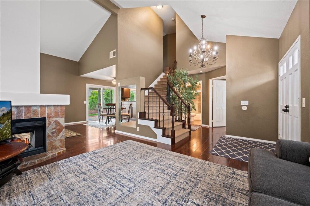 Chandelier, Dining room, Fireplace, Interior, Wood Texture Flooring