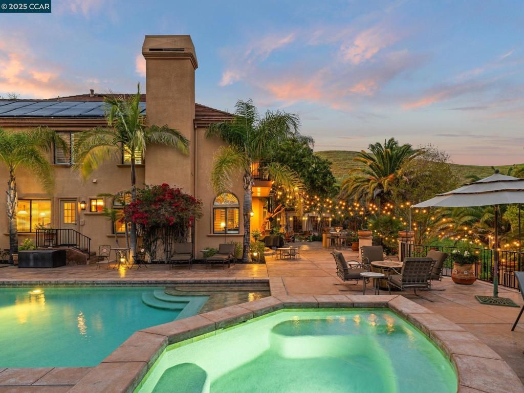 Exterior, Pool, Solar Panels