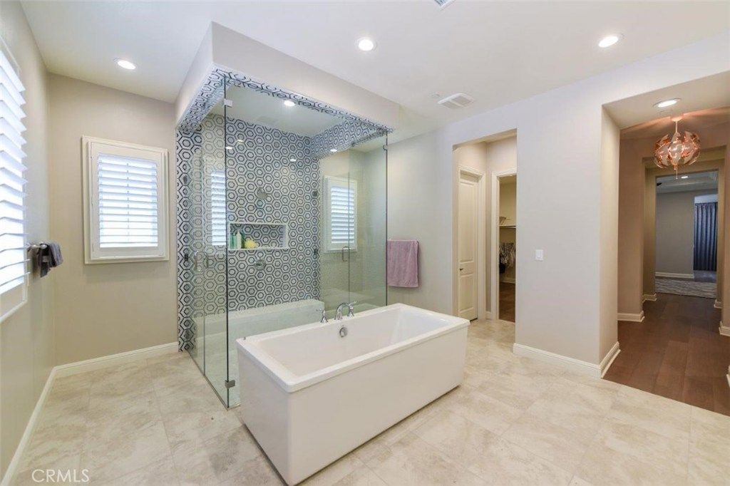 Bathroom, Free Standing Baths, Glass Shower, Interior, Recessed Lighting, Wood Texture Flooring