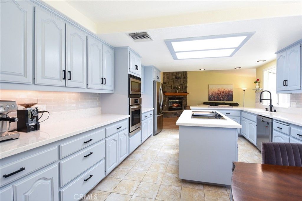 Fireplace, Interior, Kitchen, Stainless Steel Appliances, Stone Walls