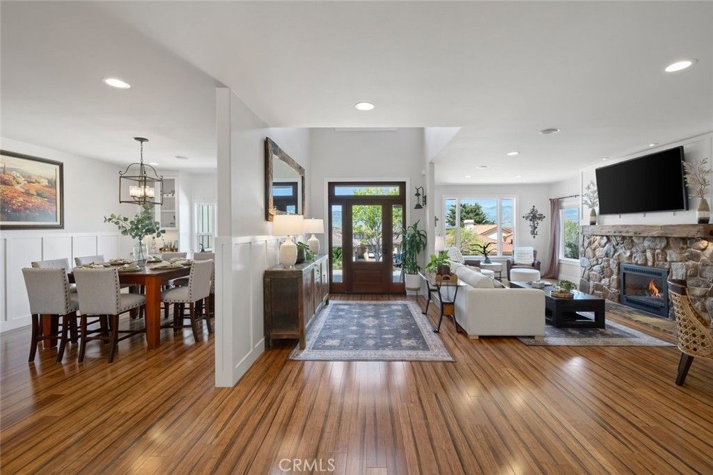 Dining room, Fireplace, Interior, Living room, Pendant Lights, Recessed Lighting, Wood Texture Flooring