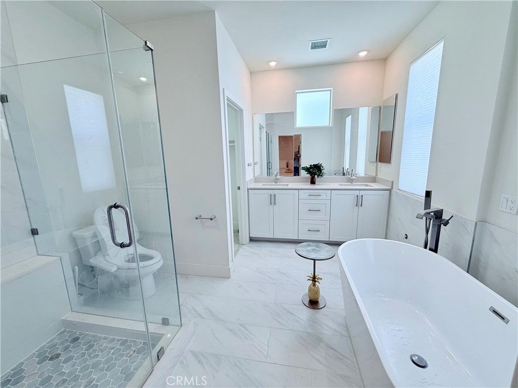 Bathroom, Dual Sink Vanities, Free Standing Baths, Glass Shower, Interior, Marble, Recessed Lighting