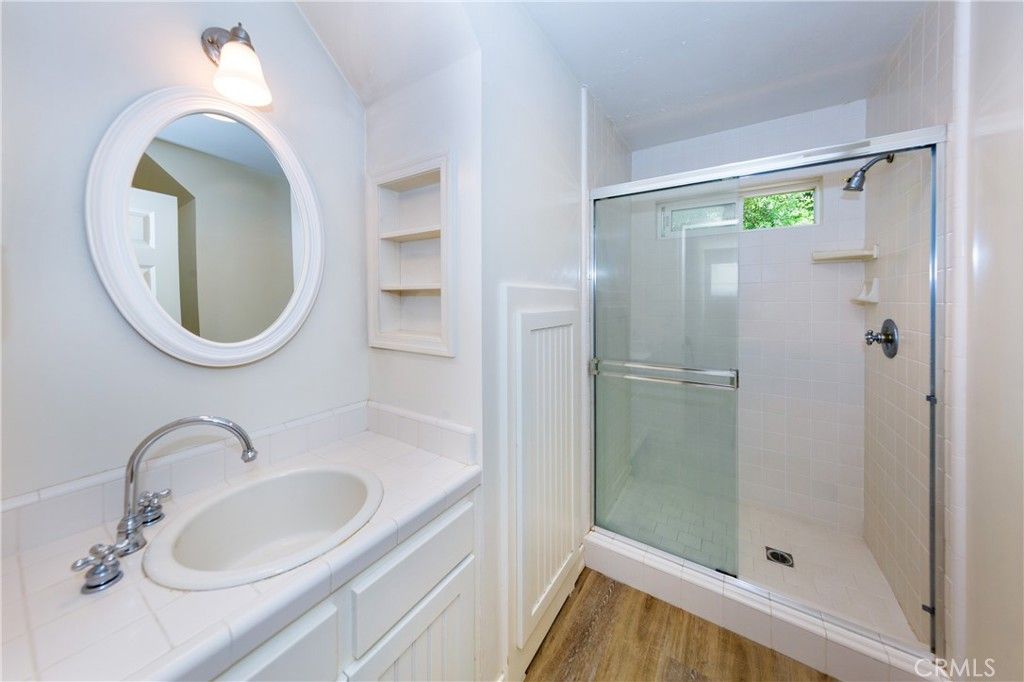 Bathroom, Glass Shower, Interior, Tile Countertops, Wood Texture Flooring