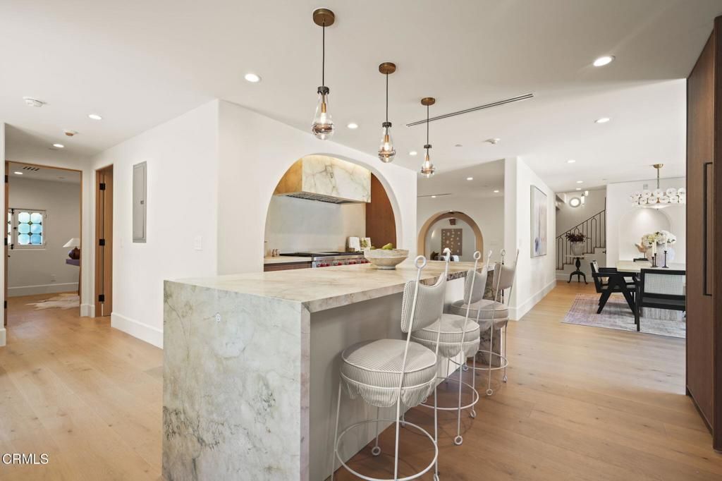Dining room, Interior, Kitchen, Pendant Lights, Recessed Lighting, Stainless Steel Appliances, Wood Texture Flooring
