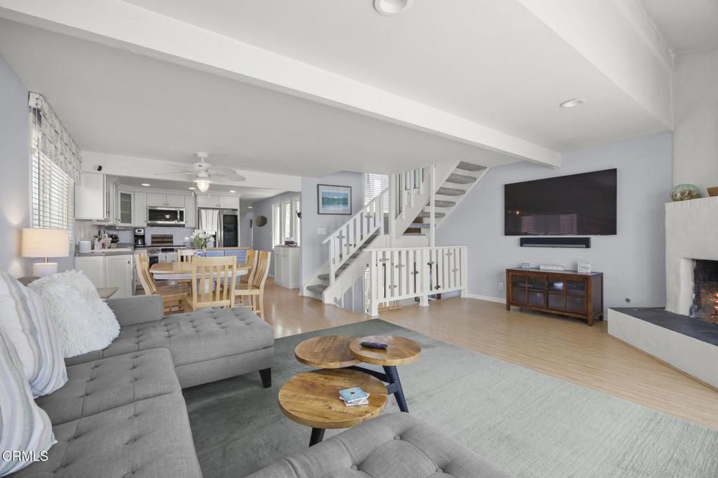 Dining room, Fireplace, Interior, Kitchen, Living room, Recessed Lighting, Wood Texture Flooring