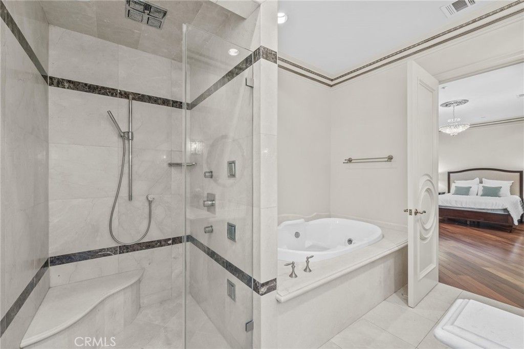 Bathroom, Bedroom, Chandelier, Glass Shower, Interior, Recessed Lighting, Wood Texture Flooring