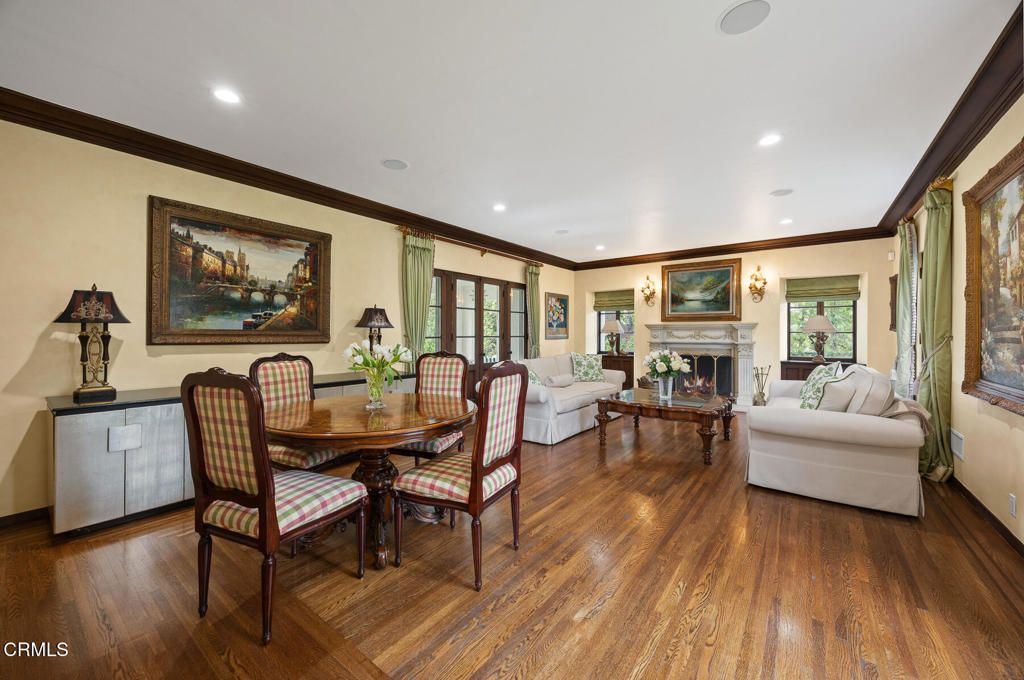 Dining room, Fireplace, Interior, Living room, Recessed Lighting, Wood Texture Flooring