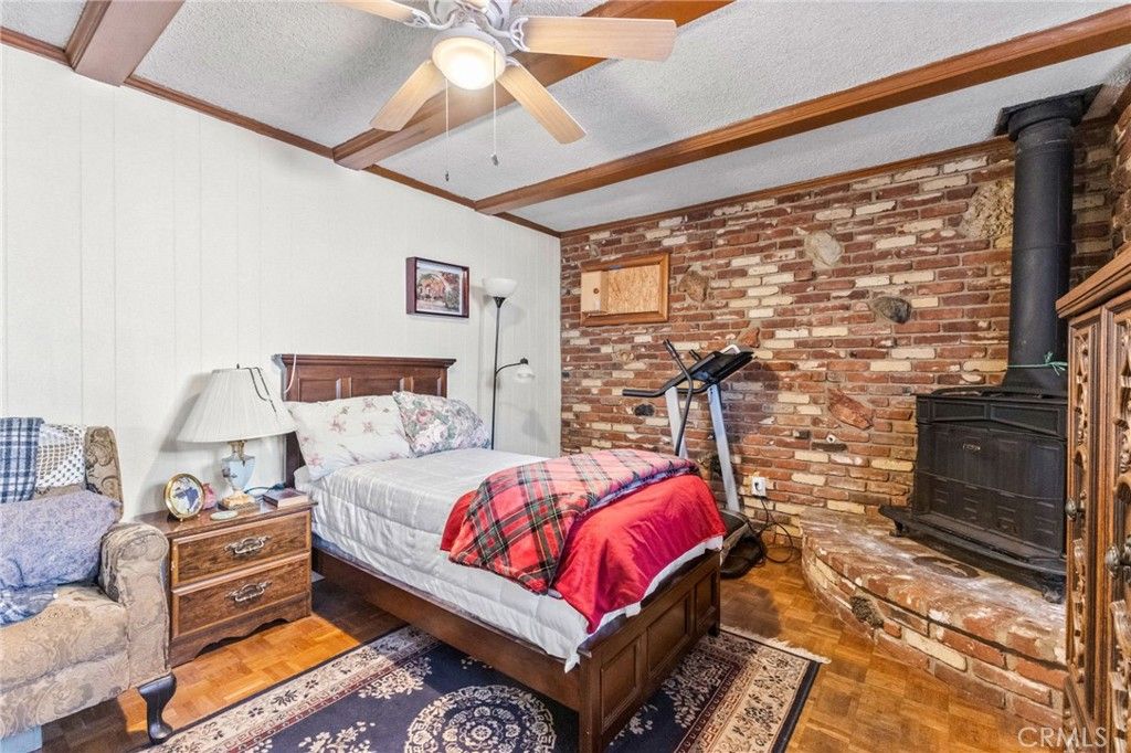 Bedroom, Fireplace, Fitness Equipment, Interior, Stone Walls, Wood Texture Flooring