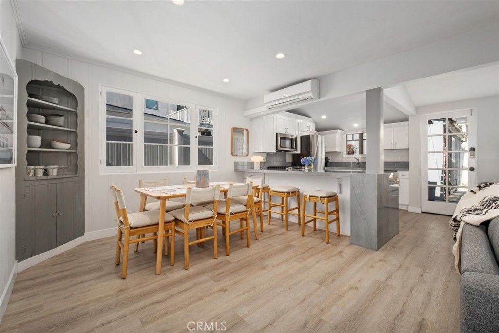 Dining room, Interior, Kitchen, Recessed Lighting, Stainless Steel Appliances, Wood Texture Flooring