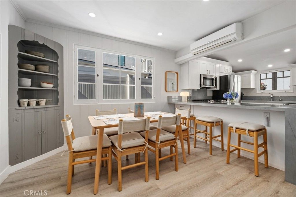 Dining room, Interior, Kitchen, Recessed Lighting, Stainless Steel Appliances, Wood Texture Flooring