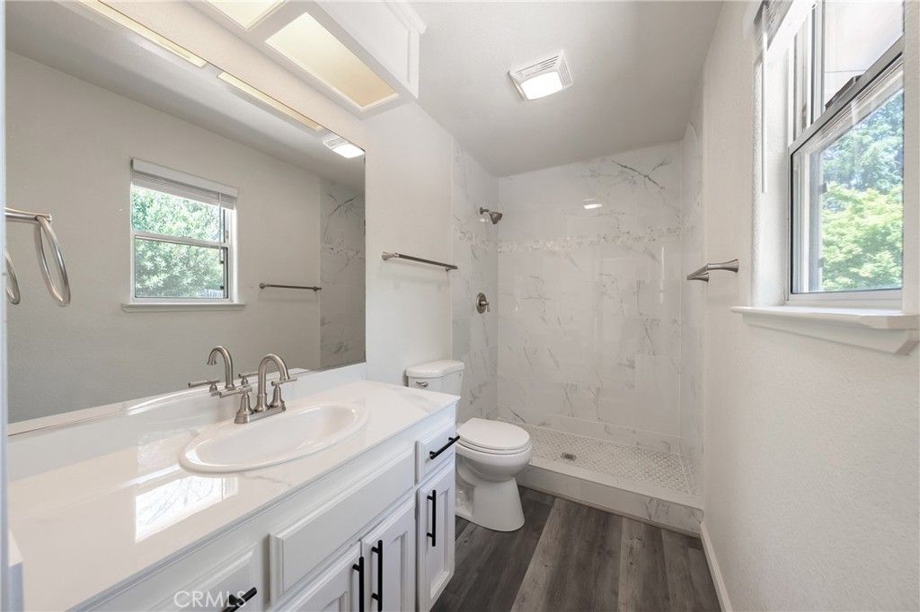 Bathroom, Glass Shower, Interior, Marble Walls, Wood Texture Flooring