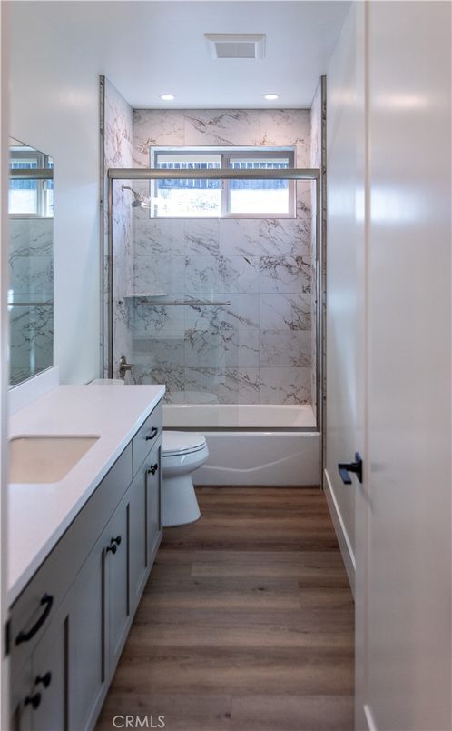 Bathroom, Interior, Marble Walls, Recessed Lighting, Wood Texture Flooring