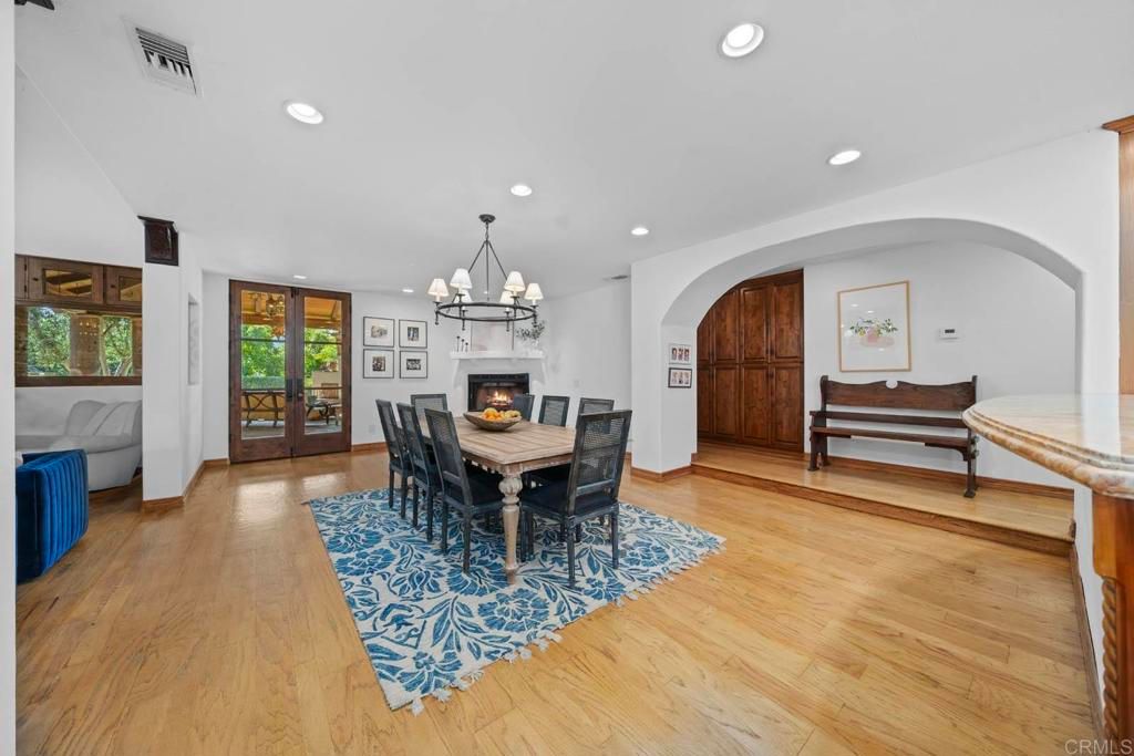 Chandelier, Dining room, Fireplace, Interior, Recessed Lighting, Wood Texture Flooring