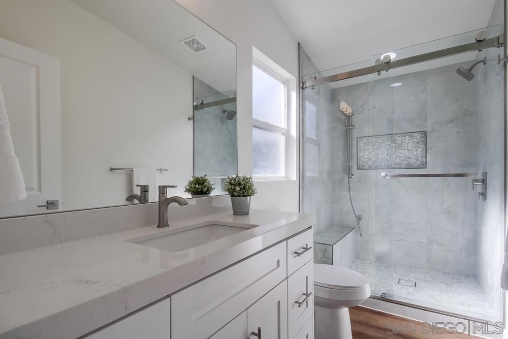 Bathroom, Glass Shower, Interior, Marble Walls, Wood Texture Flooring