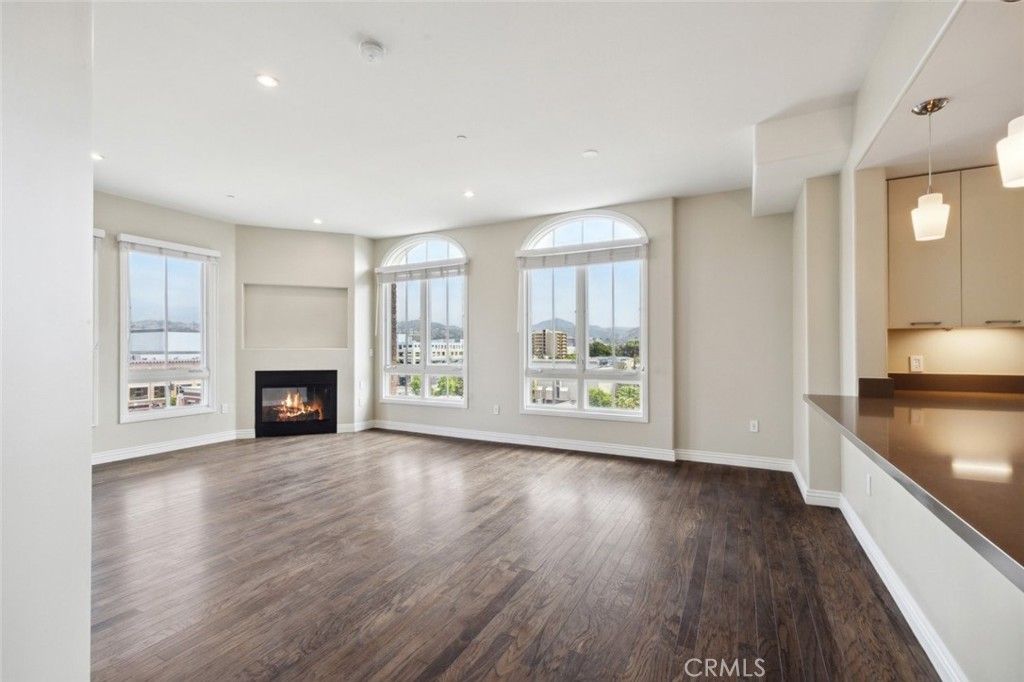 Empty room, Fireplace, Interior, Pendant Lights, Recessed Lighting, Wood Texture Flooring