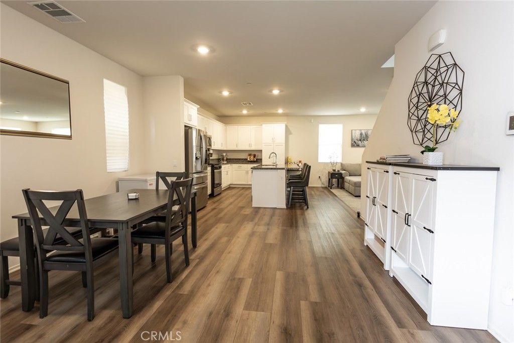 Dining room, Interior, Kitchen, Recessed Lighting, Stainless Steel Appliances, Wood Texture Flooring