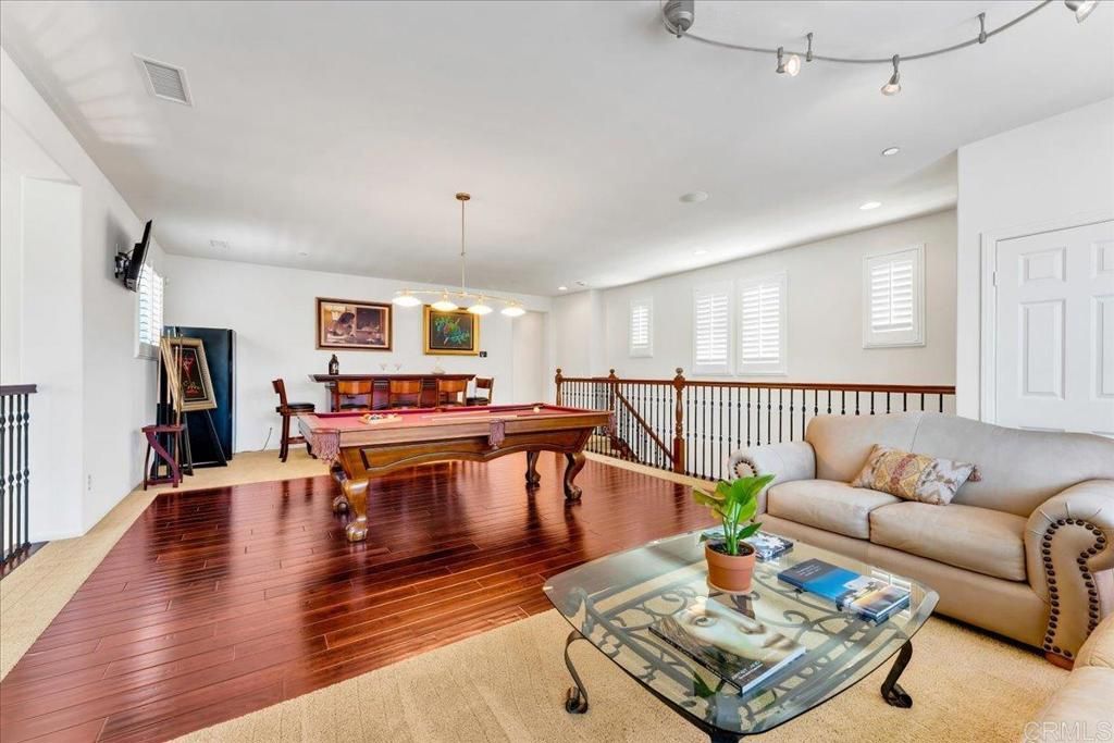 Billiard Table, Game Room, Interior, Living room, Pendant Lights, Recessed Lighting, Wood Texture Flooring