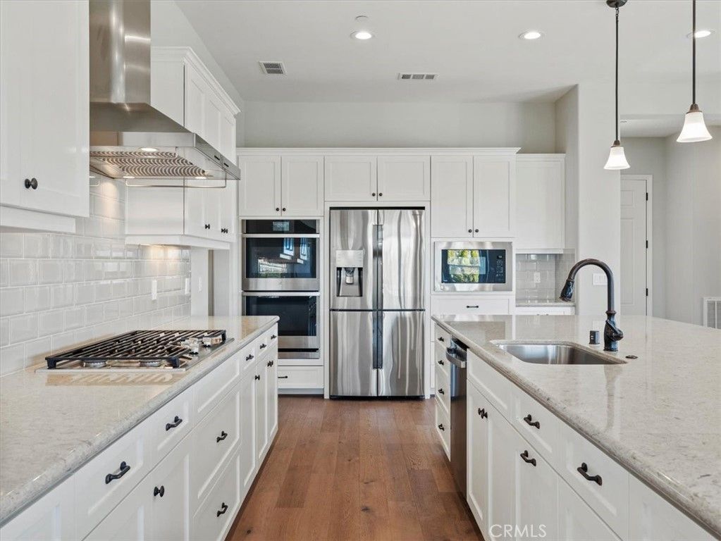 Interior, Kitchen, Pendant Lights, Recessed Lighting, Stainless Steel Appliances, Wood Texture Flooring