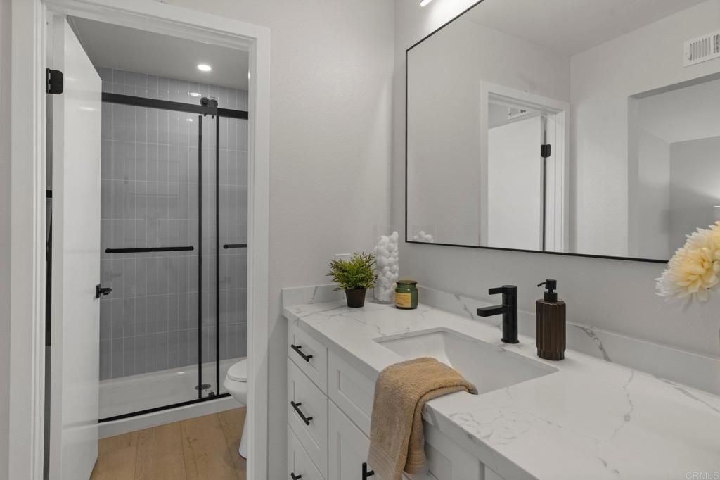 Bathroom, Glass Shower, Interior, Recessed Lighting, Wood Texture Flooring