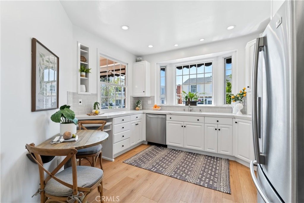 Dining room, Interior, Kitchen, Recessed Lighting, Stainless Steel Appliances, Wood Texture Flooring