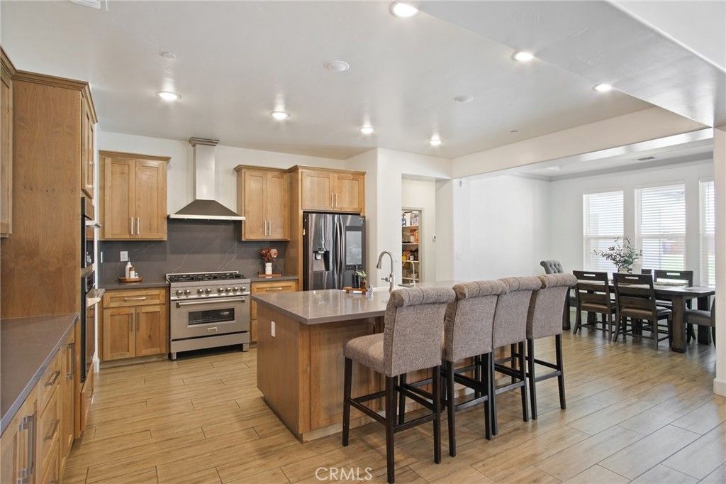 Dining room, Interior, Kitchen, Recessed Lighting, Stainless Steel Appliances, Wood Texture Flooring
