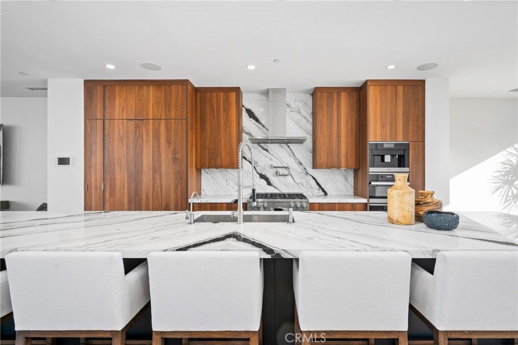 Interior, Kitchen, Marble Walls, Recessed Lighting, Stainless Steel Appliances