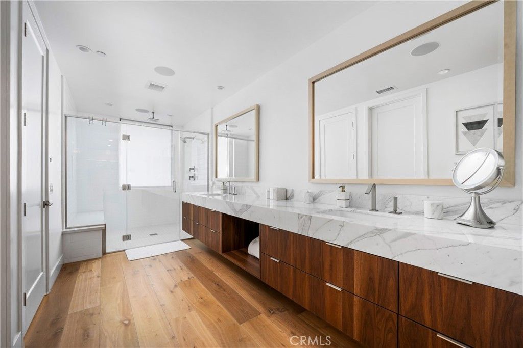 Bathroom, Dual Sink Vanities, Glass Shower, Interior, Recessed Lighting, Wood Texture Flooring