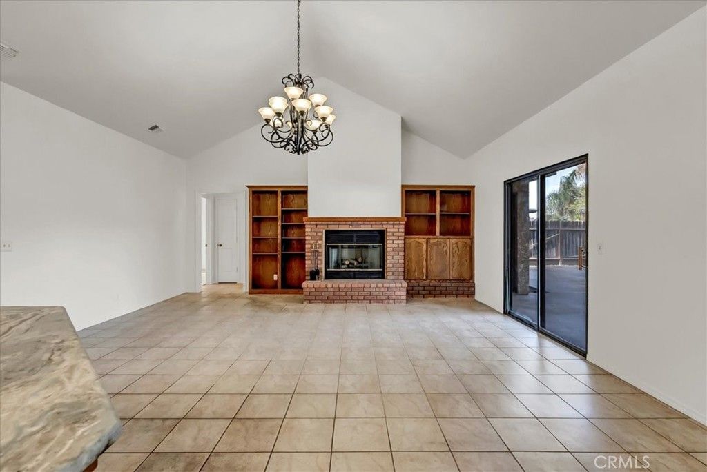 Chandelier, Empty room, Fireplace, Interior