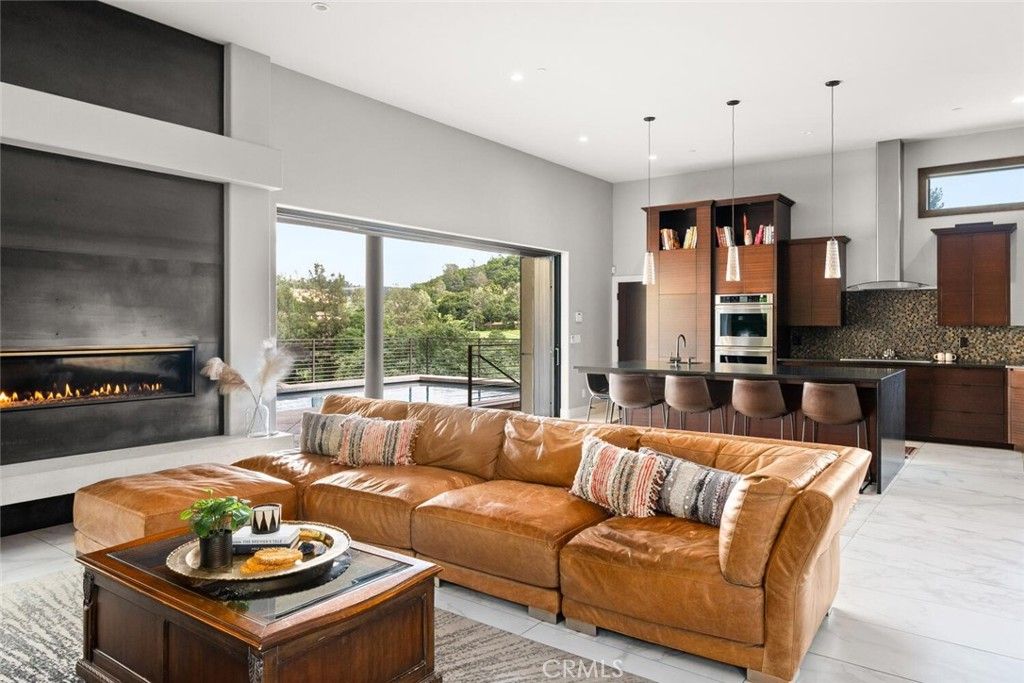 Fireplace, Interior, Kitchen, Living room, Marble, Pendant Lights, Recessed Lighting, Stainless Steel Appliances