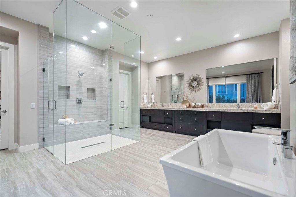 Bathroom, Dual Sink Vanities, Free Standing Baths, Glass Shower, Interior, Recessed Lighting, Wood Texture Flooring