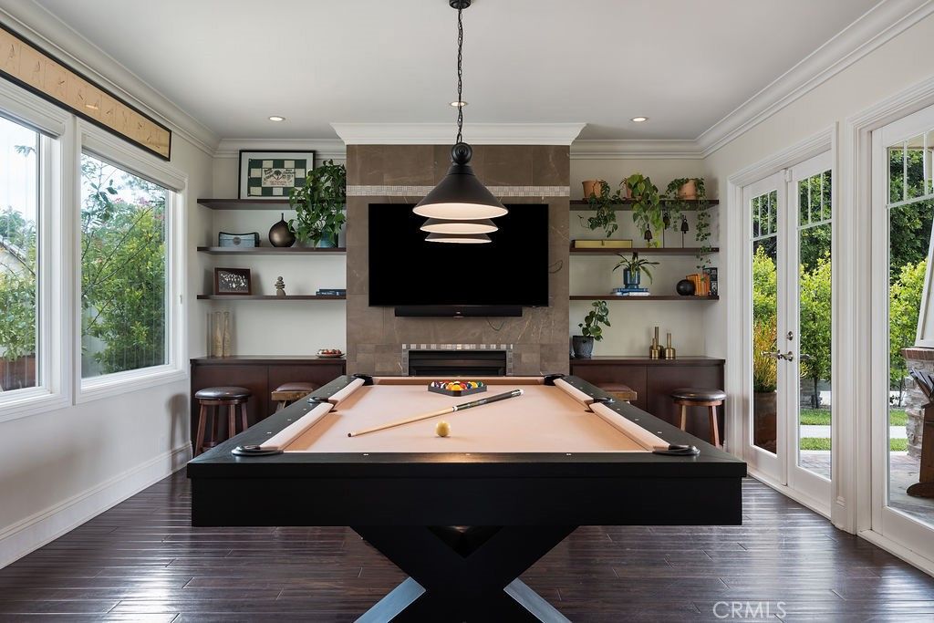 Billiard Table, Fireplace, Game Room, Interior, Pendant Lights, Recessed Lighting, Wood Texture Flooring