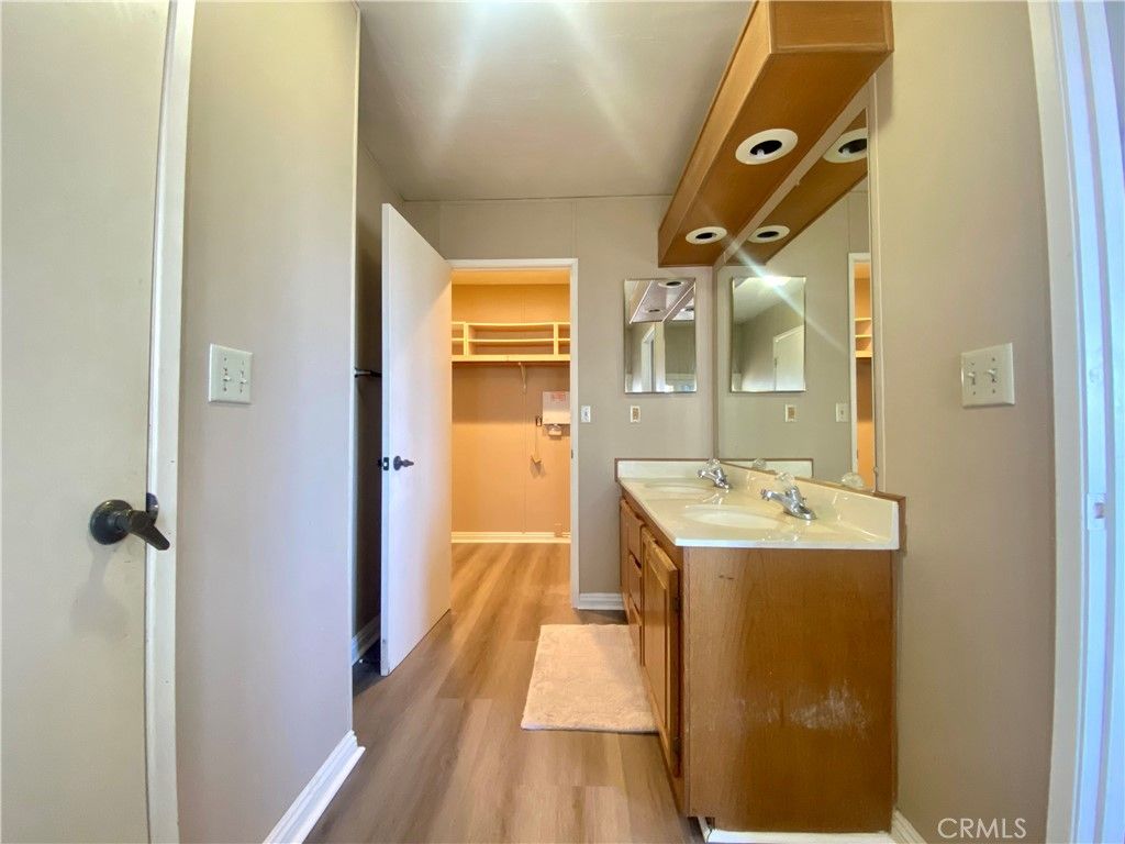 Bathroom, Dual Sink Vanities, Interior, Recessed Lighting, Wood Texture Flooring
