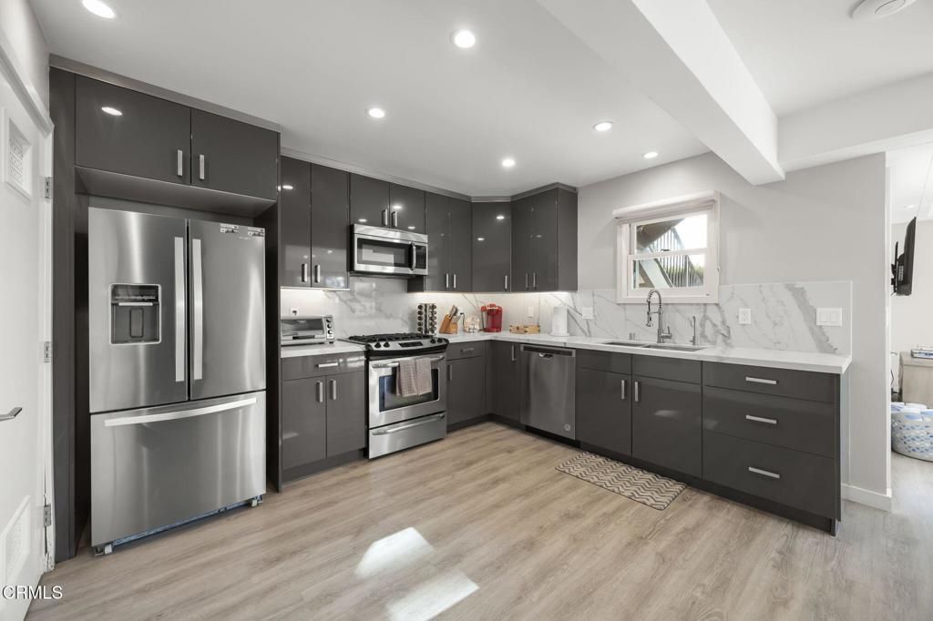 Interior, Kitchen, Recessed Lighting, Stainless Steel Appliances, Wood Texture Flooring
