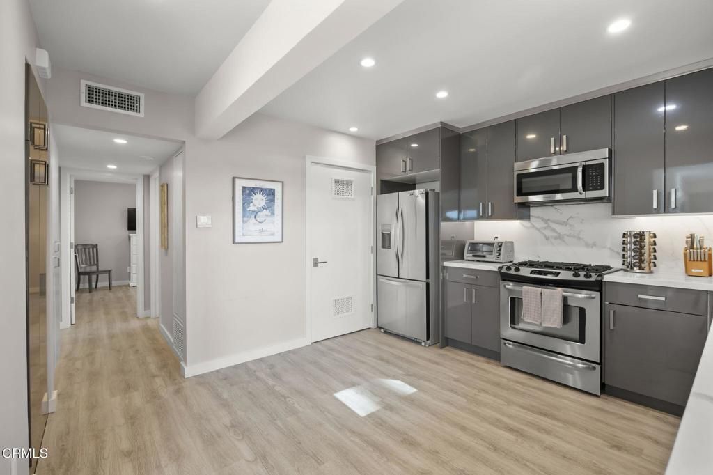Interior, Kitchen, Recessed Lighting, Stainless Steel Appliances, Wood Texture Flooring