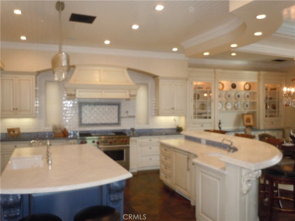 Chandelier, Interior, Kitchen, Pendant Lights, Recessed Lighting, Stainless Steel Appliances, Wood Texture Flooring