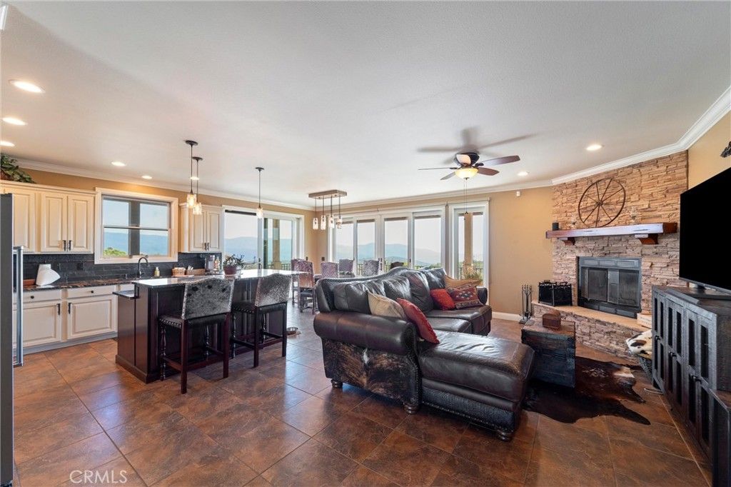 Dining room, Fireplace, Interior, Kitchen, Living room, Pendant Lights, Recessed Lighting, Stone Walls, Water