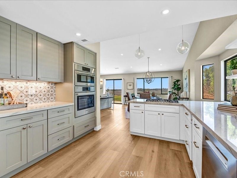 Dining room, Interior, Kitchen, Pendant Lights, Recessed Lighting, Stainless Steel Appliances, Wood Texture Flooring