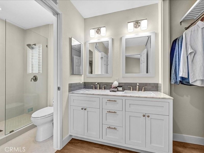 Bathroom, Dual Sink Vanities, Glass Shower, Interior, Wood Texture Flooring