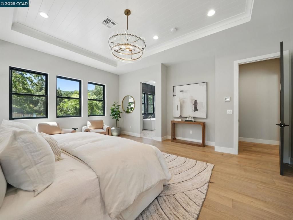 Bedroom, Chandelier, Interior, Pendant Lights, Recessed Lighting, Wood Texture Flooring