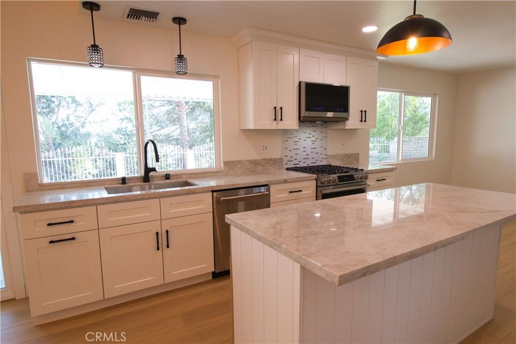 Interior, Kitchen, Pendant Lights, Recessed Lighting, Stainless Steel Appliances, Wood Texture Flooring