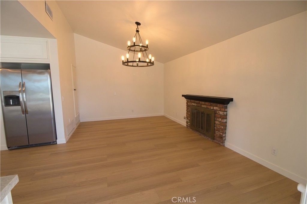 Chandelier, Empty room, Fireplace, Interior, Wood Texture Flooring