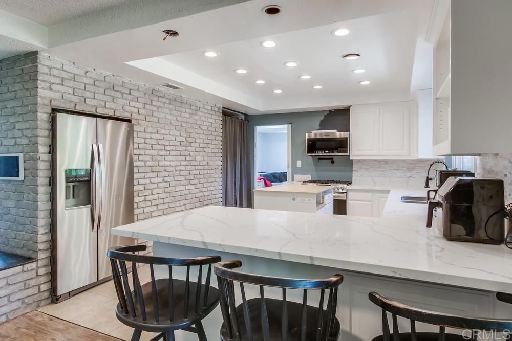 Interior, Kitchen, Recessed Lighting, Stainless Steel Appliances, Stone Walls