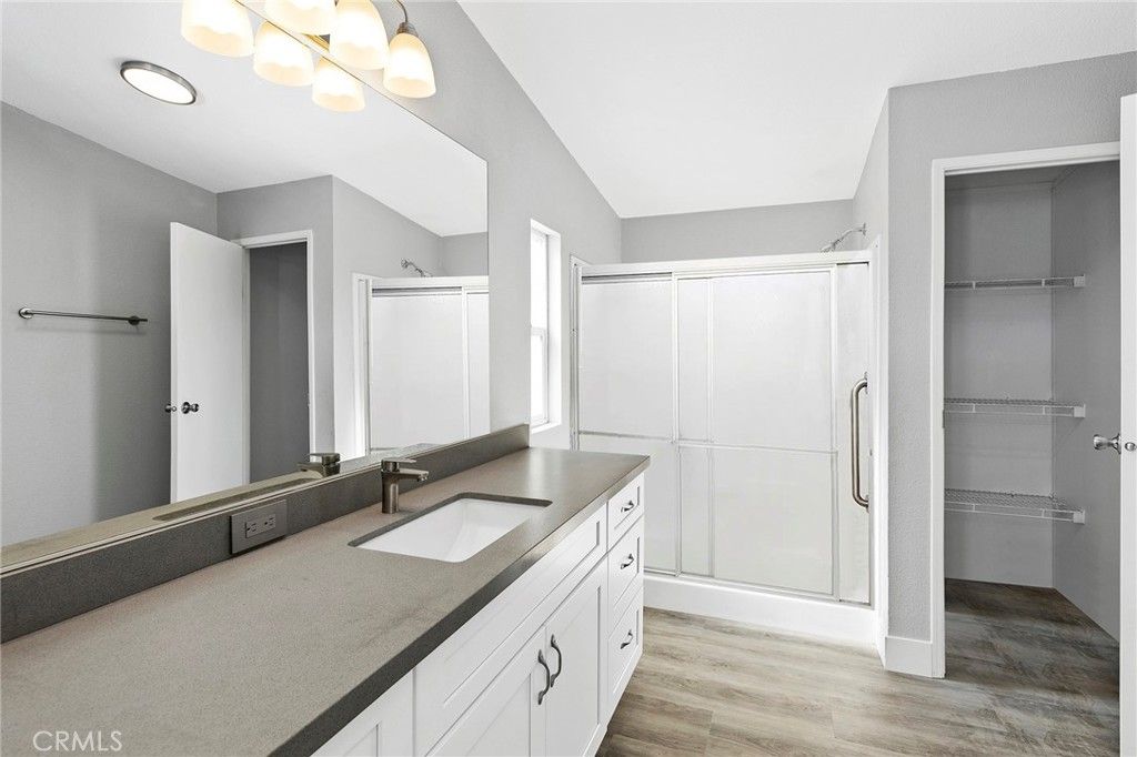 Bathroom, Dual Sink Vanities, Glass Shower, Interior, Walk-in Closets, Wood Texture Flooring