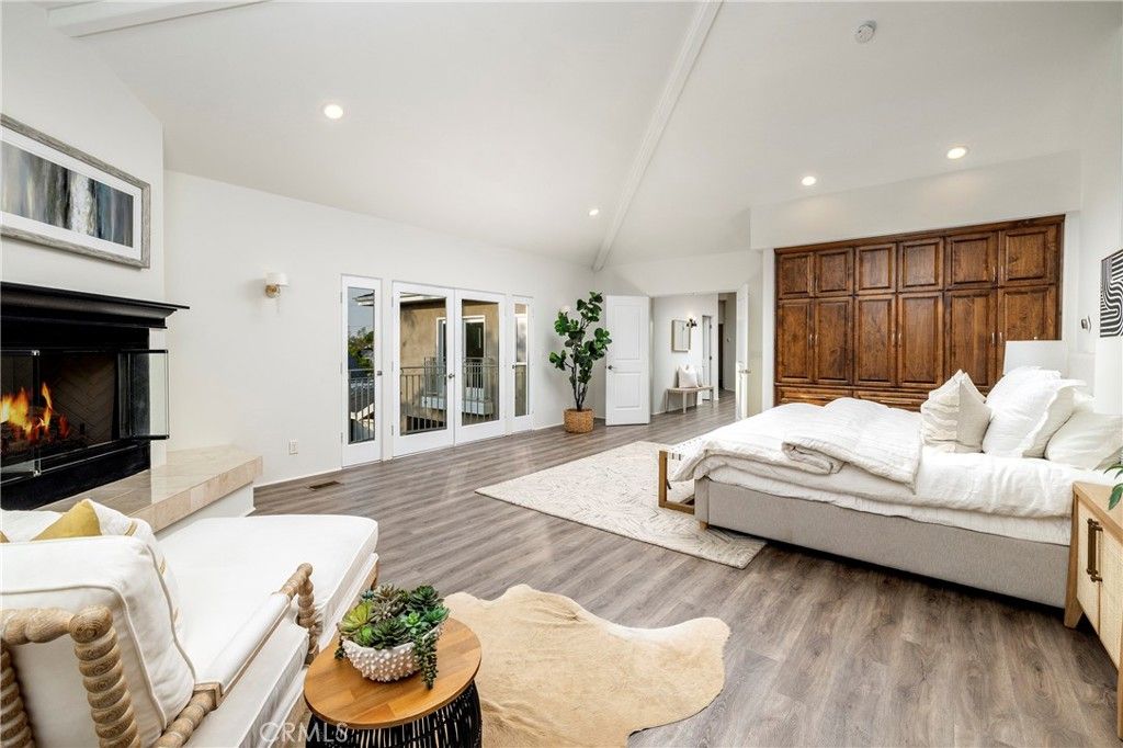 Bedroom, Fireplace, Interior, Recessed Lighting, Wood Texture Flooring