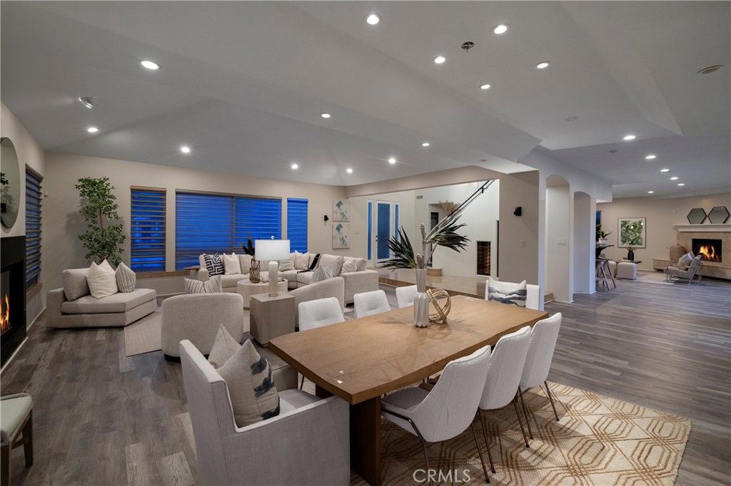 Dining room, Fireplace, Interior, Living room, Recessed Lighting, Wood Texture Flooring