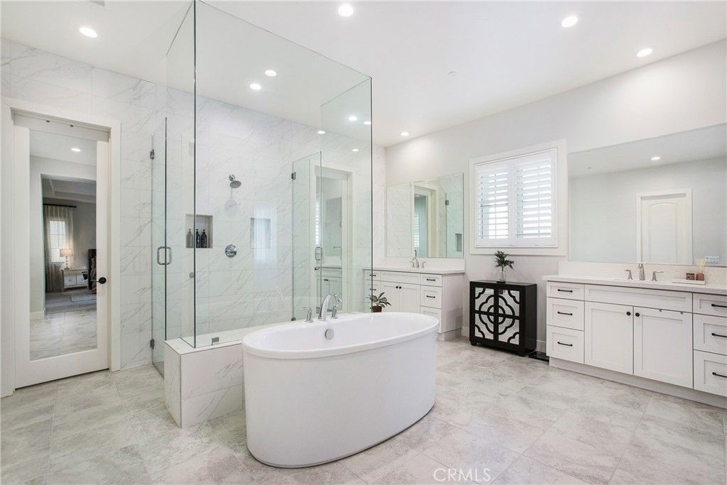 Bathroom, Dual Sink Vanities, Glass Shower, Interior, Marble Walls, Recessed Lighting