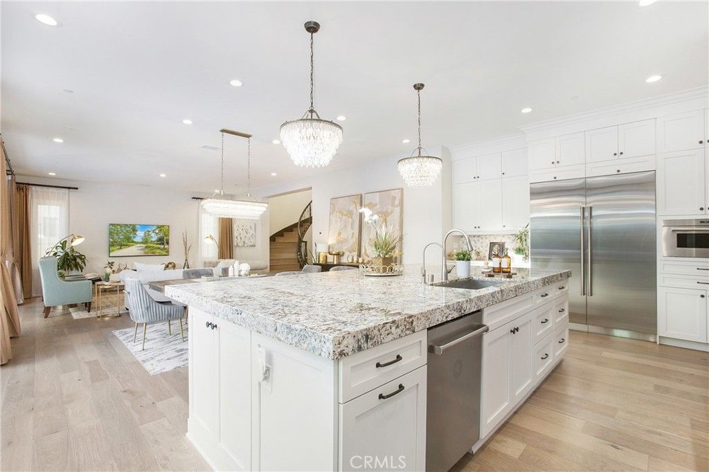 Dining room, Interior, Kitchen, Living room, Pendant Lights, Recessed Lighting, Stainless Steel Appliances, Wood Texture Flooring