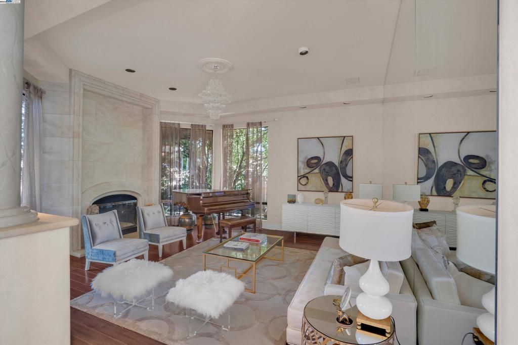 Fireplace, Interior, Living room, Piano, Recessed Lighting, Wood Texture Flooring
