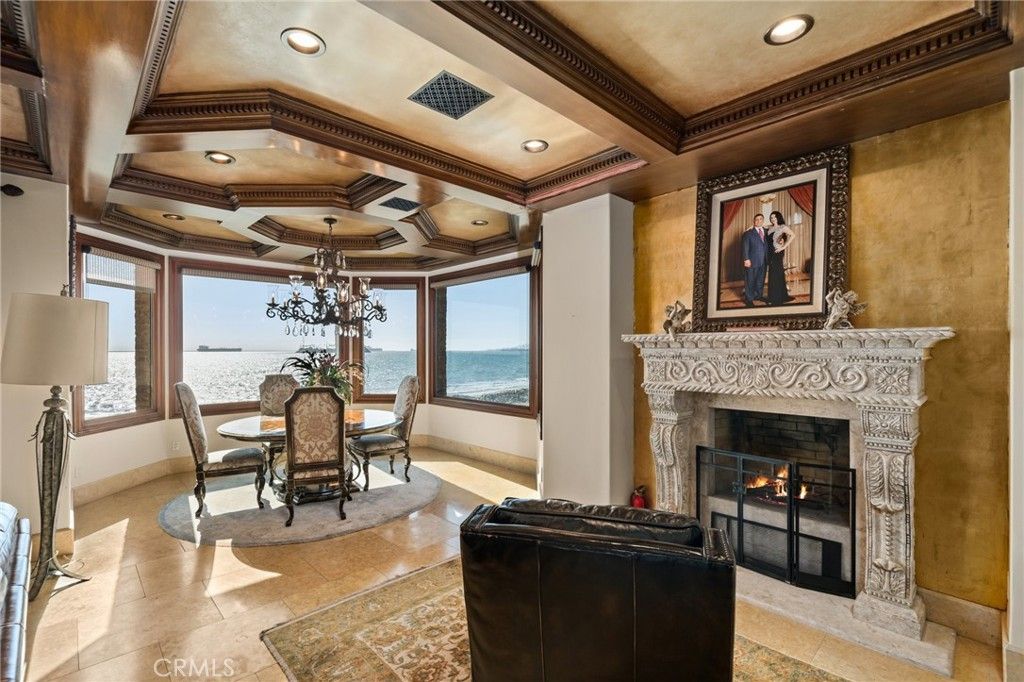 Chandelier, Dining room, Fireplace, Interior, Recessed Lighting, Water, Wooden Beams
