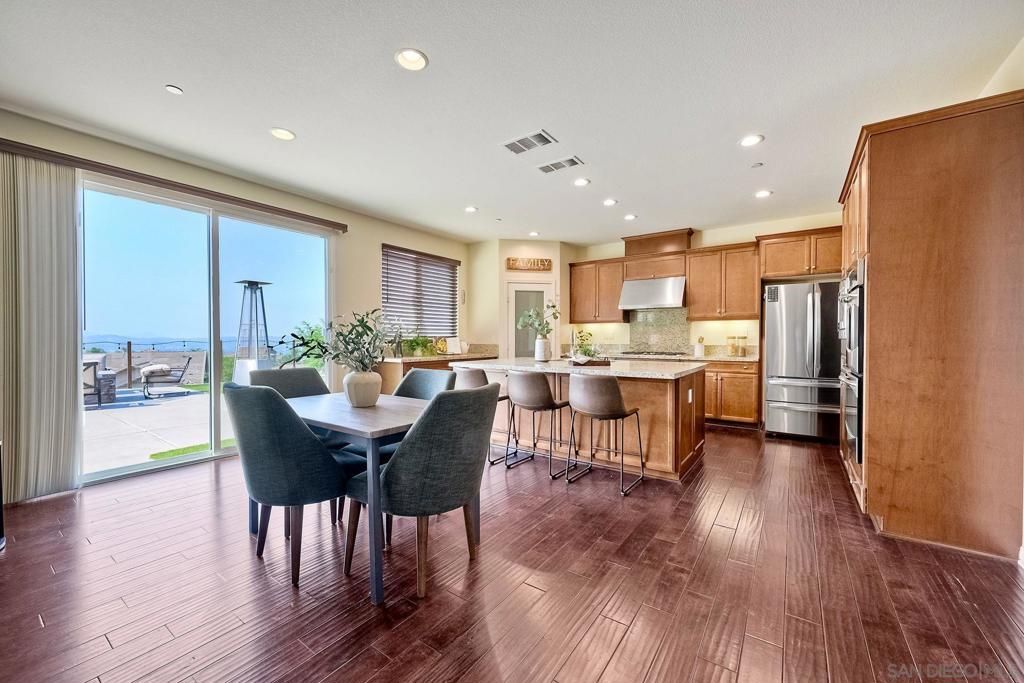 Dining room, Interior, Kitchen, Recessed Lighting, Stainless Steel Appliances, Water, Wood Texture Flooring